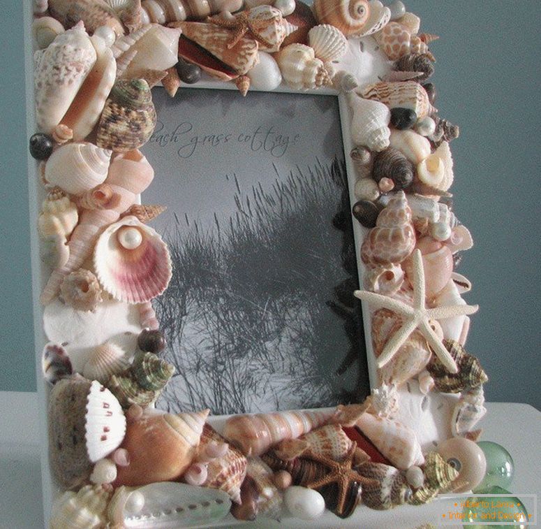Photo frame decorated with seashells with glue