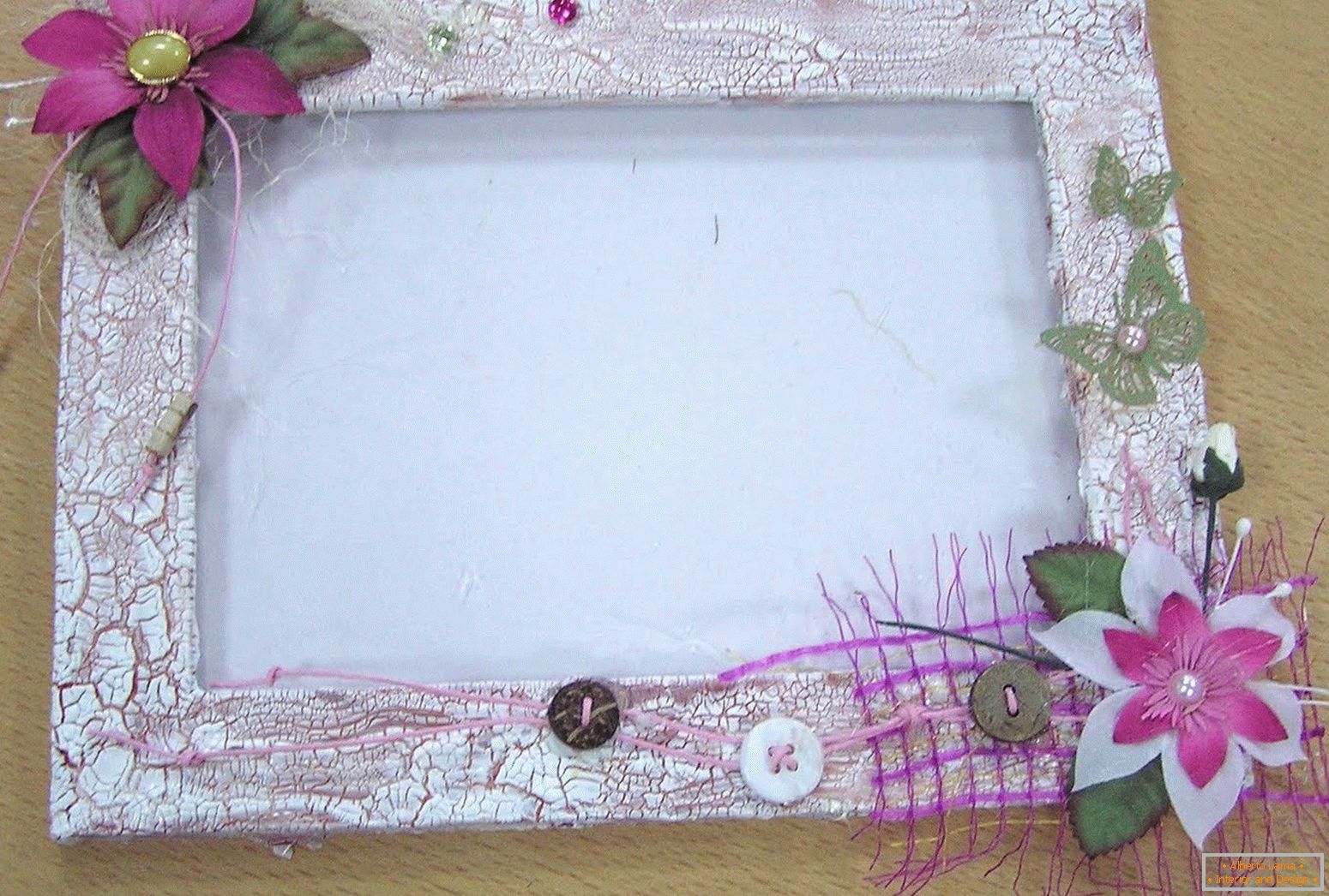 Decorating the frame with artificial flowers