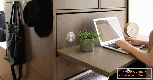 Pull-out desk in a small apartment