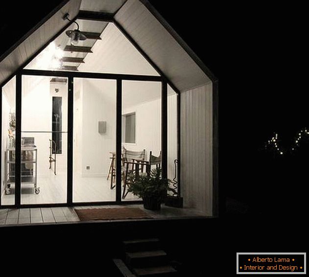 Interior of a hut in the woods at night