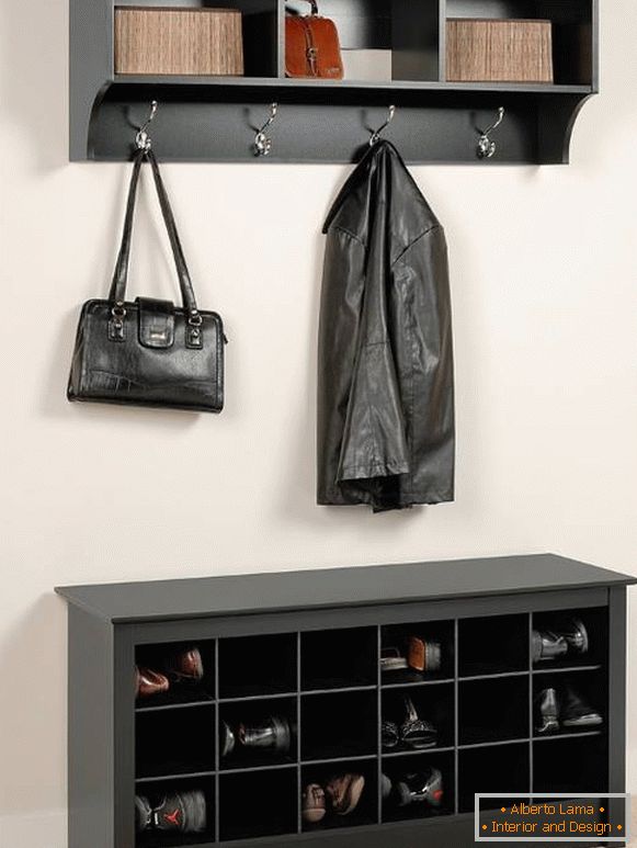 Convenient hanger and banquet in the hallway with shelves for shoes