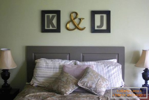 Old door as headboard for bed