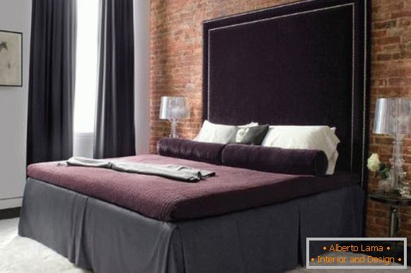 Luxurious bed with a high soft velvet headboard