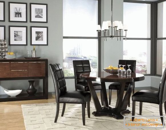 Elegant round dining table with leather chairs