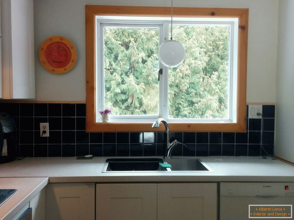 Large window in the design of a small kitchen