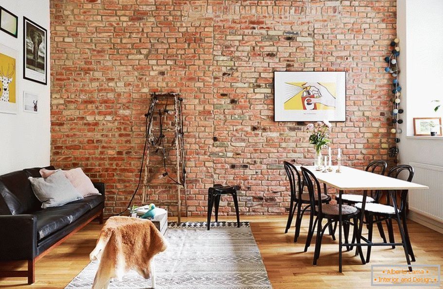 Wallpaper with a brick pattern in the living-dining room