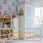 Cabinet and chest of drawers along the wall in the nursery