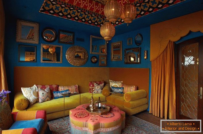 The character of the living room of a wealthy Indian family is a combination of Indian colors, luxury and many many decorative gizmos.