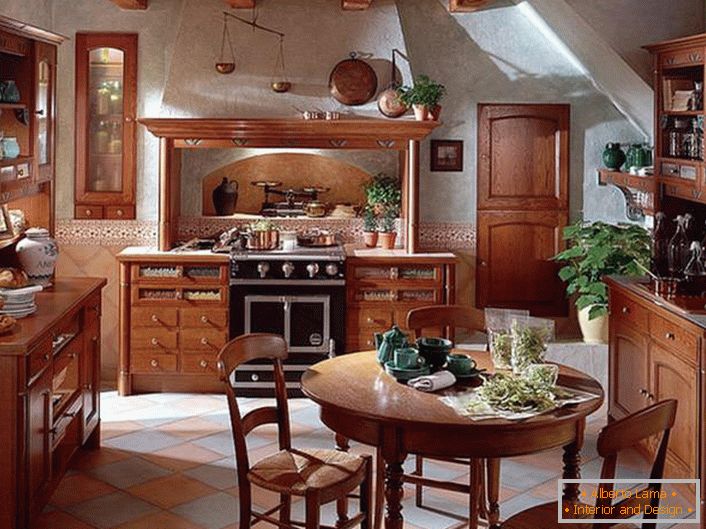 Classical country cuisine with properly selected furniture. Harmonious decoration of the kitchen space was green flowers in clay pots of different sizes.