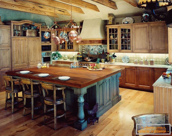 In the best traditions of country in the design of the kitchen space, natural materials are mostly used.