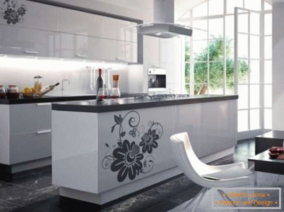 The interior of a large kitchen combined with a living room in a private house - photo