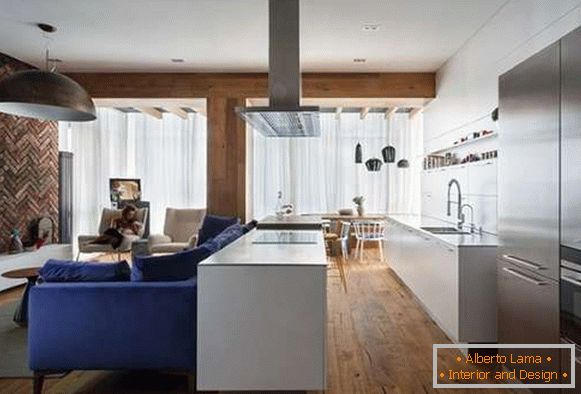 Modern interior of the living room kitchen in a private house