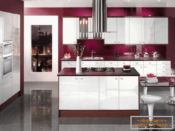 Luxurious kitchen of a private house in white and red colors