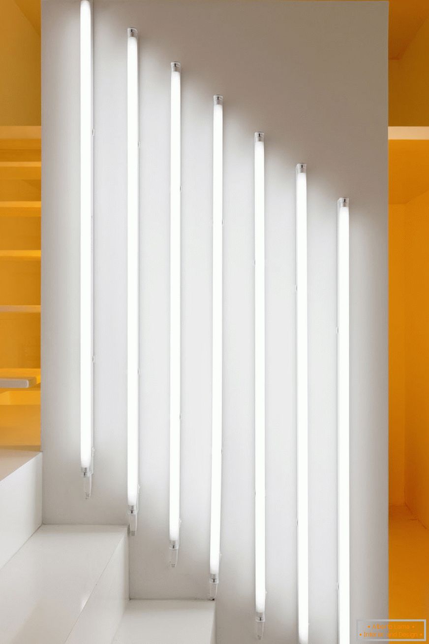 White vertical lamps on the wall