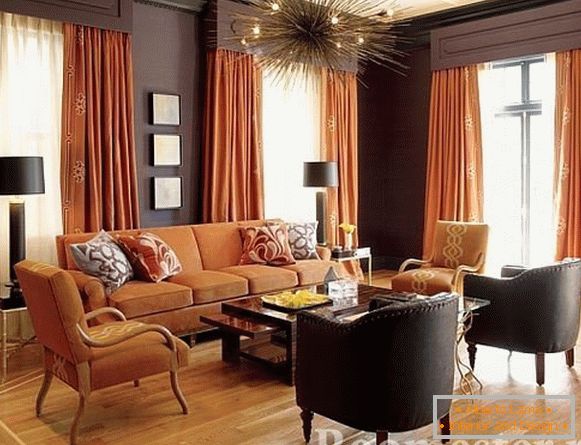 Mandarin curtains and an orange sofa