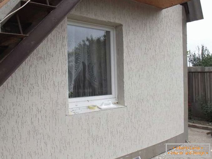 Plastering bark beetle on facades of houses, photo 9