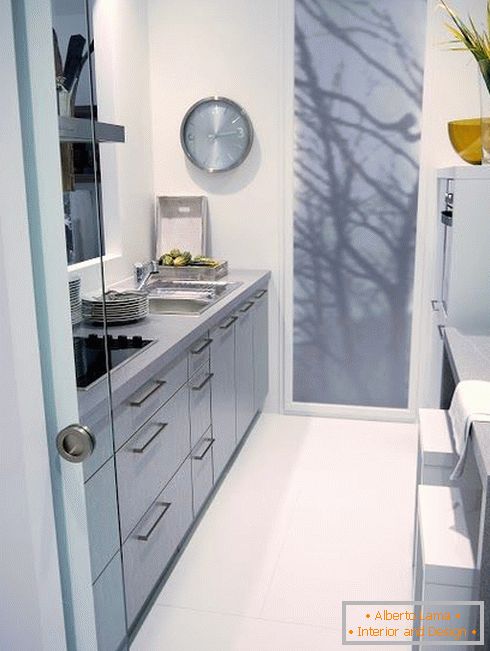Narrow kitchen in white color
