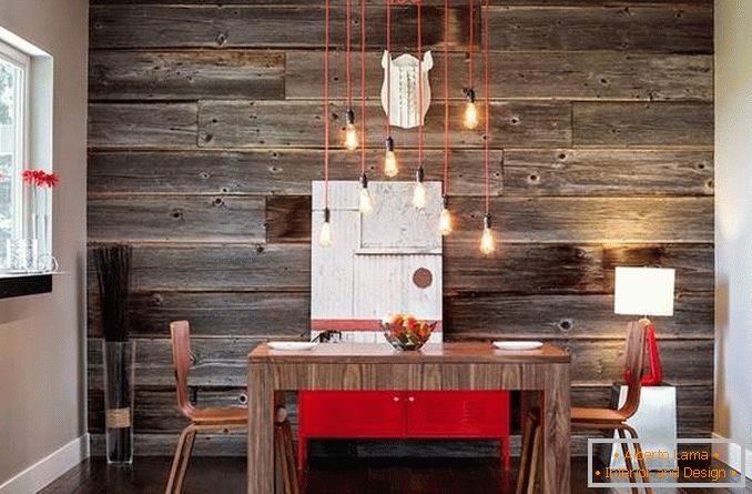 Decor of walls with wooden panels in the dining area by their own hands