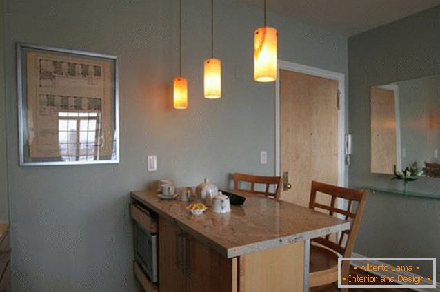 Suspended light above the kitchen island