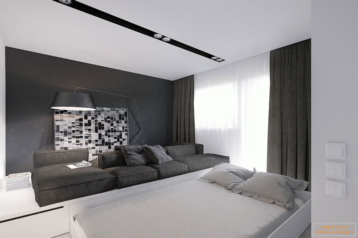 A pull-out bed in the living room of a small apartment