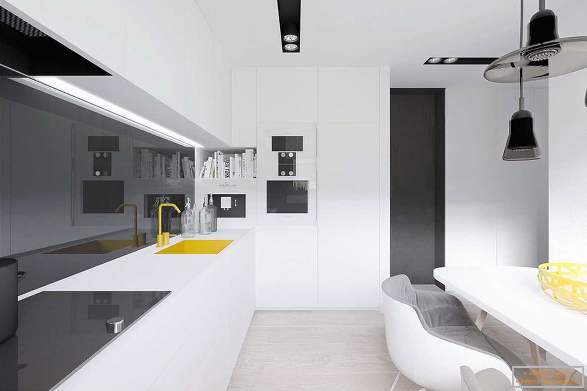 Yellow accents in the interior of black and white cuisine