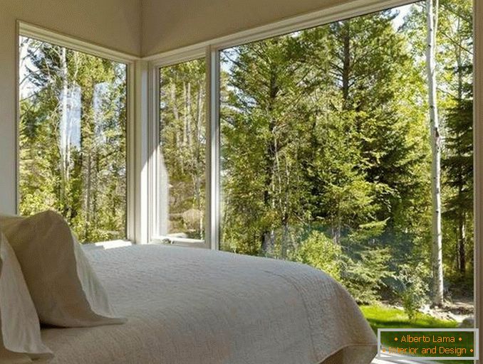 bedroom interior design with corner window photo