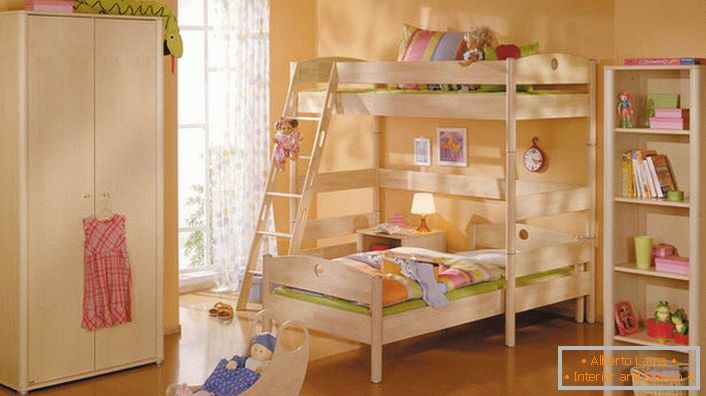 Children's room in high-tech style with light wooden furniture. Simplicity of furniture is compensated by its functionality and practicality.
