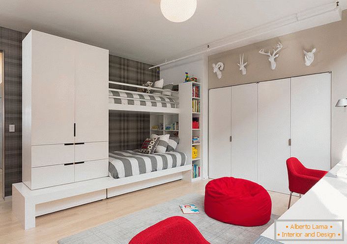 A large children's room in high-tech style for twins. Attention attracts furniture red and wardrobe, mounted in the wall.