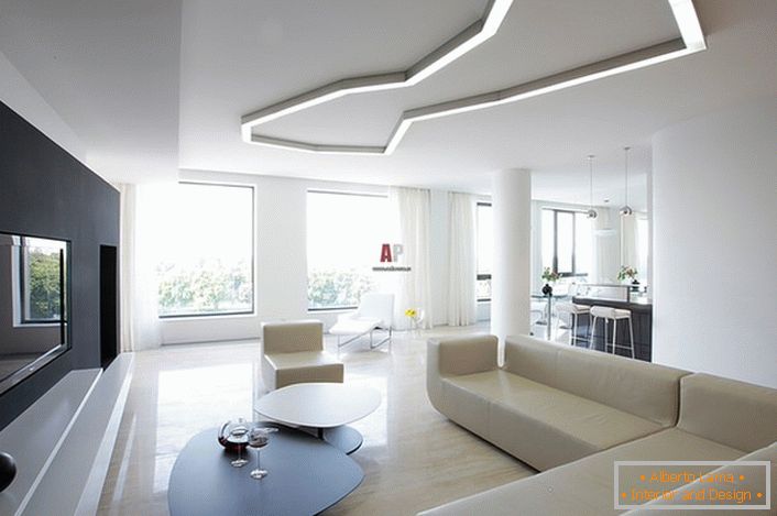 An example of the correct selection of lighting for the living room in the style of minimalism. In accordance with the requirements of style in the creation of interior geometric shapes and strict lines are used.