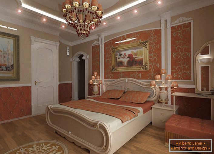 A spacious bedroom in the baroque style is decorated in coral colors.