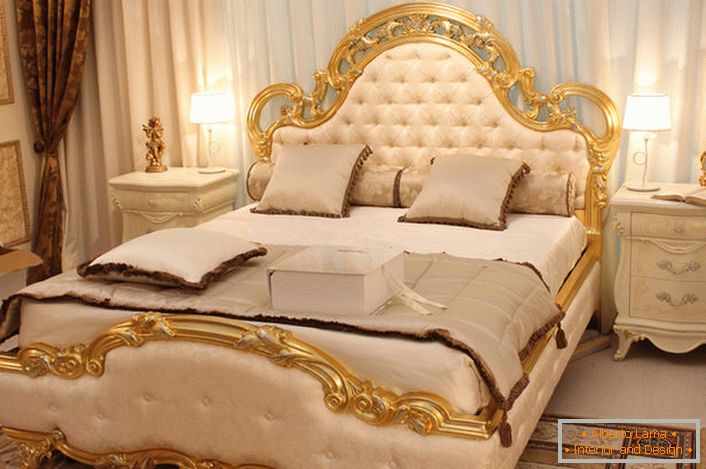 The backs of the bed are covered with soft silk of beige color in accordance with the requirements of the Baroque style.
