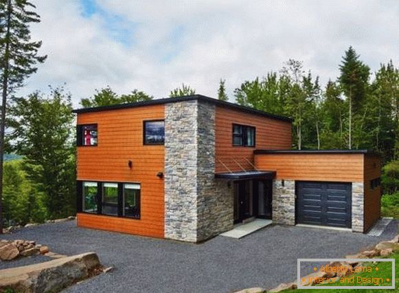 Wooden and stone facades of private houses photo