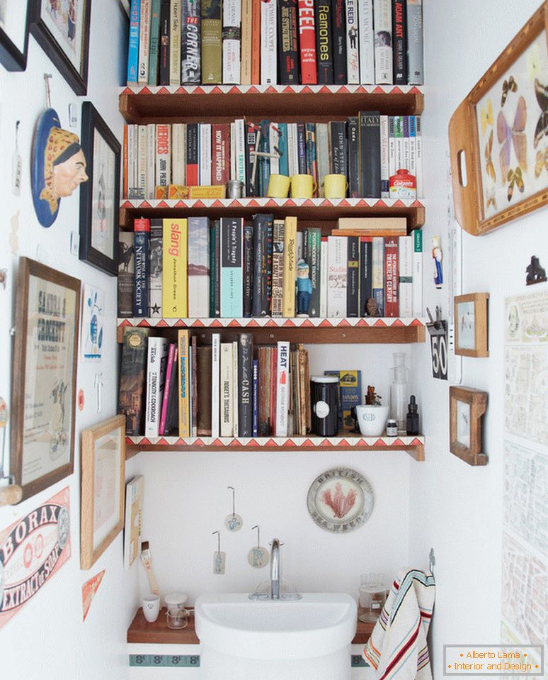 Book shelves above the washbasin