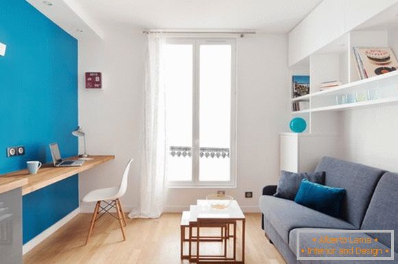 Blue wall in a white apartment