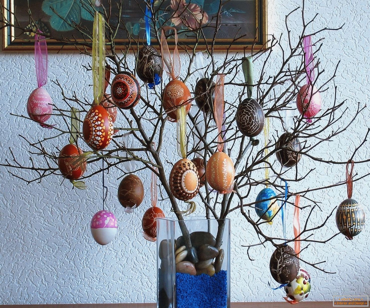 Branch with Easter eggs in a vase
