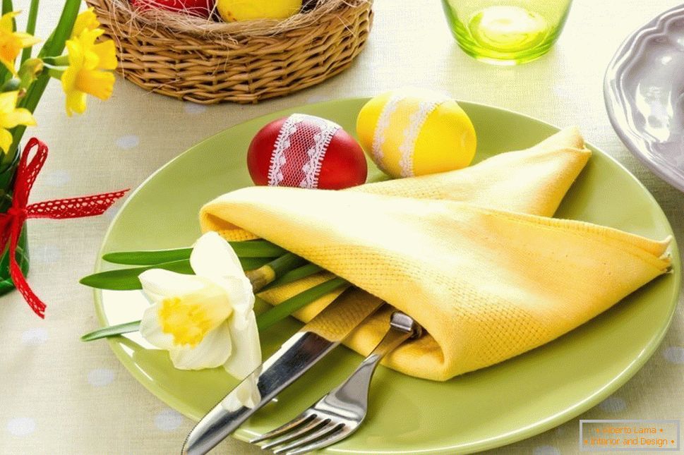 Eggs and a daffodil on a plate