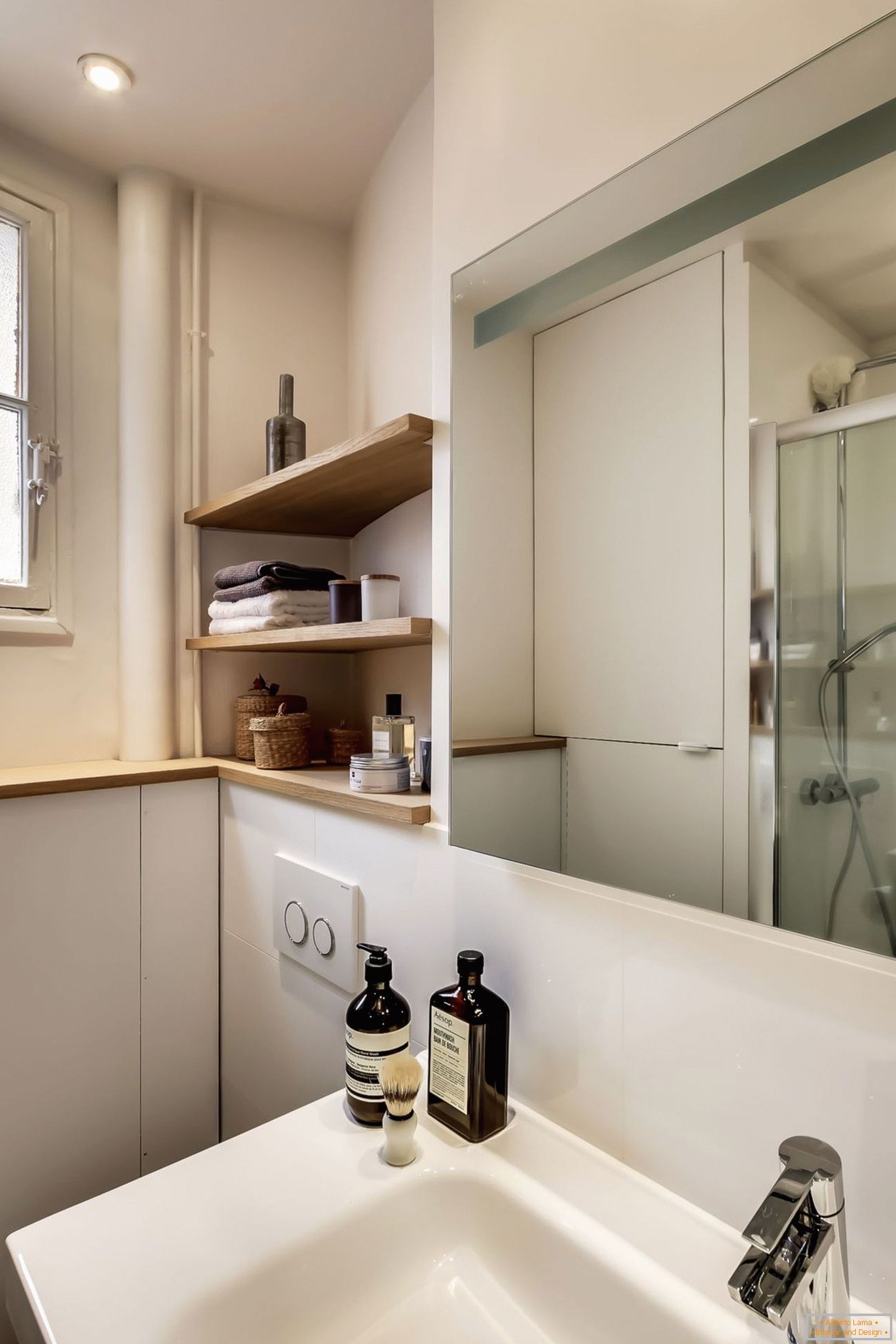 A small bathroom in white color