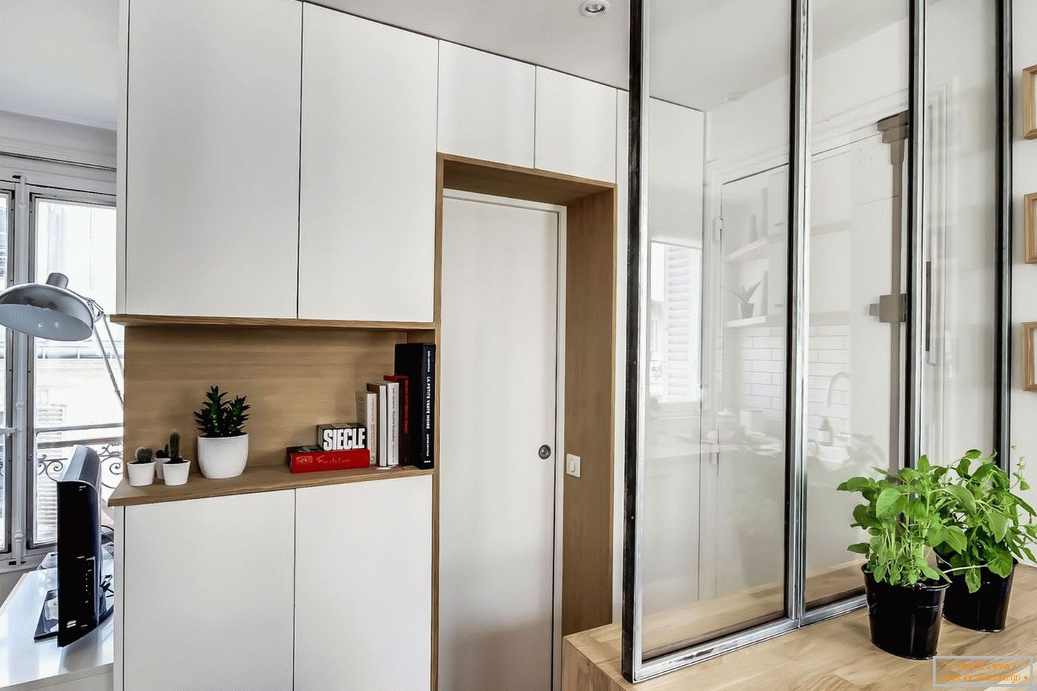 Glass partition in the interior of a small apartment