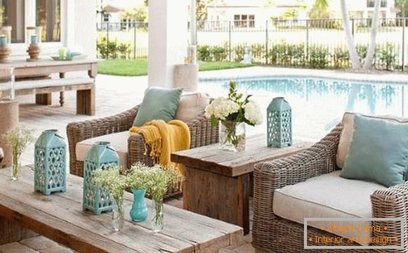 Wicker chairs made of natural rattan on the veranda