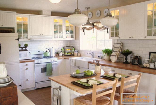 Kitchen interior with a small island с держателем для полотенец