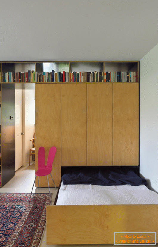 Folding bed in a small studio apartment
