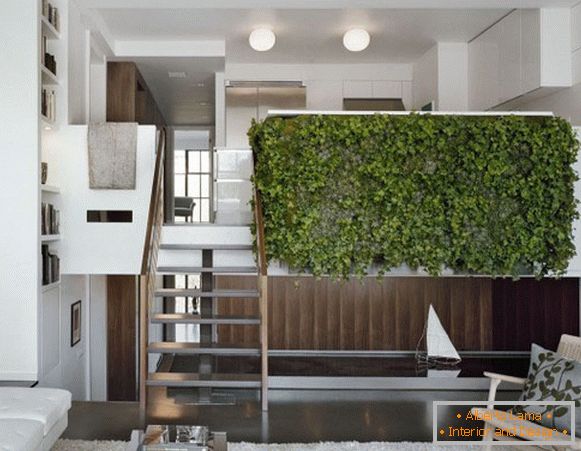Plants in the interior of a two-level apartment