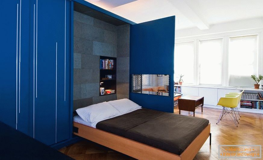 Folding bed in the design of a small apartment