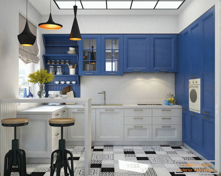 Favorable in the Mediterranean interior also looks a combination of white and saturated blue. The kitchen set is equipped with a large number of functional and roomy shelves and drawers.