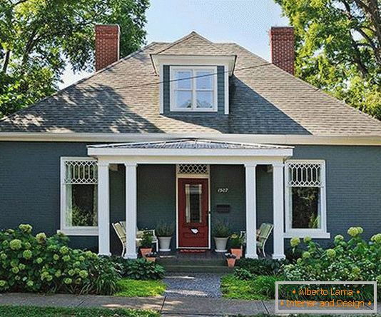 Painting the cottage in a dark color (after)