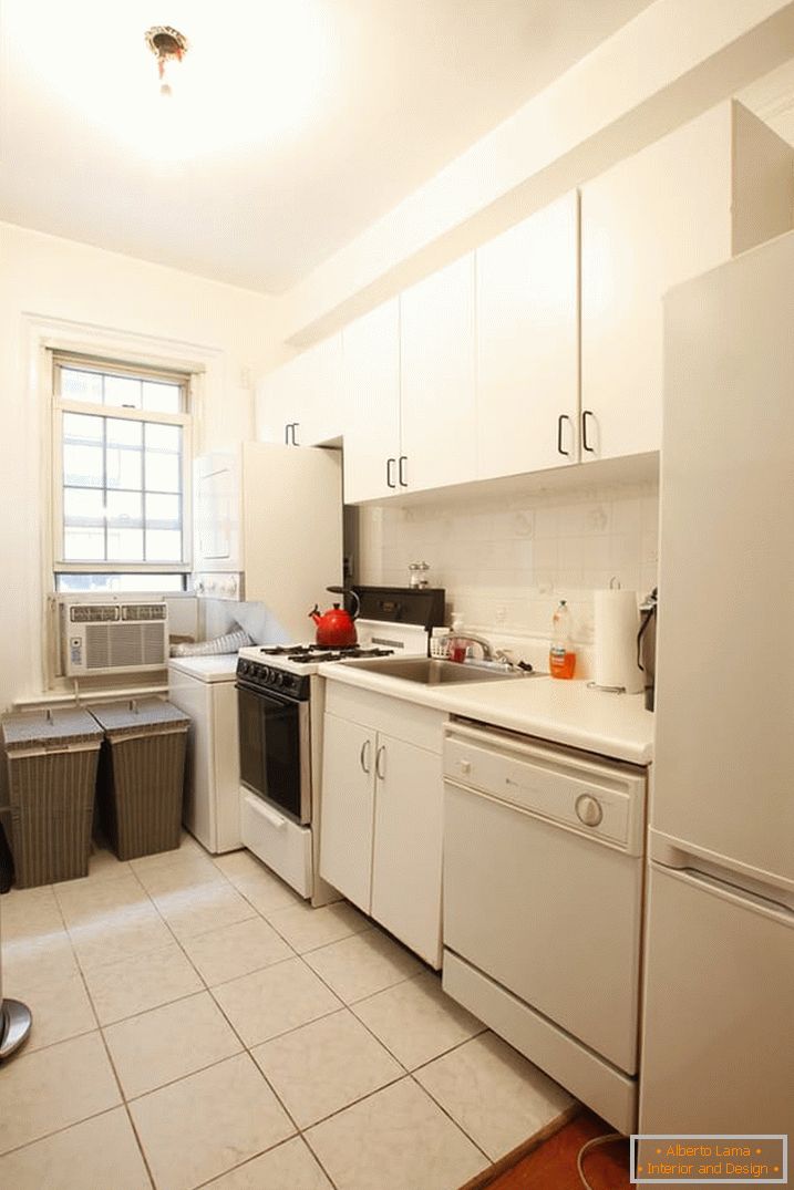 Interior of a narrow kitchen before repair