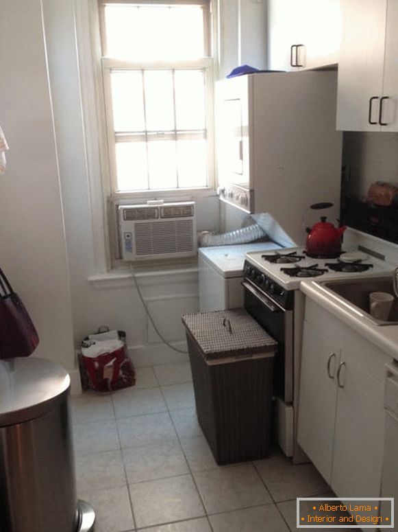 Interior of a narrow kitchen before repair