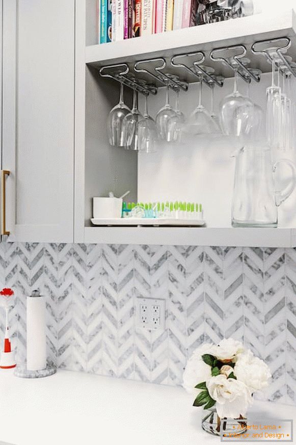 Interior of a narrow kitchen in gray color