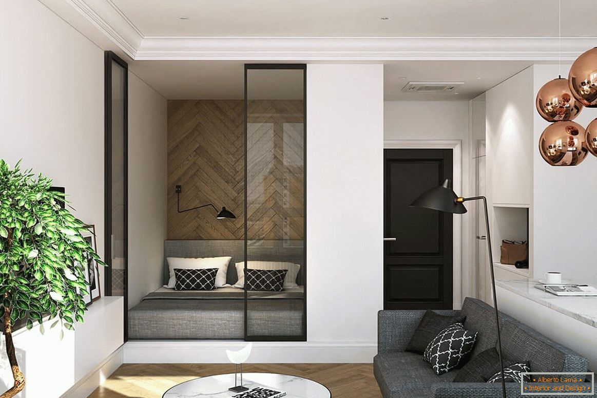 Bed in a niche behind glass partitions