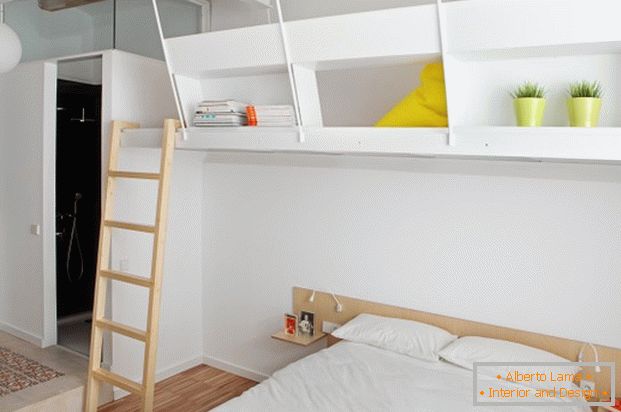 The project of a mini apartment: a bedroom in white color